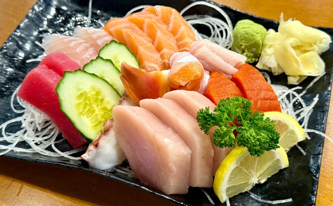 Assorted sashimi with cucumber and shredded daikon
